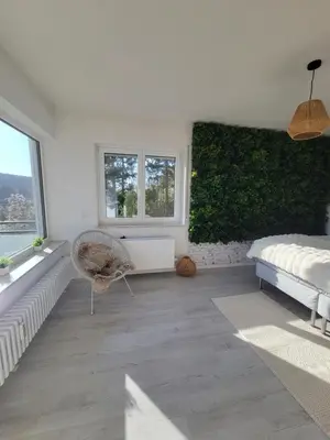 Ein Bett oder Betten in einem Zimmer der Unterkunft Vineyard-Suites Traumferienwohnung mit Panoramablick und Weinidylle