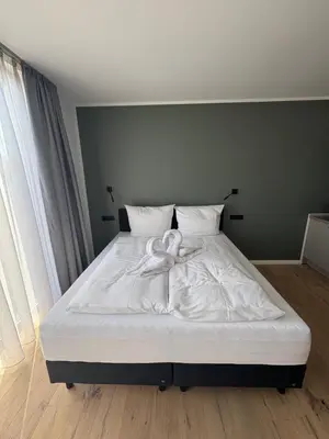 Ein Bett oder Betten in einem Zimmer der Unterkunft New Age Boardinghaus Bad Rappenau