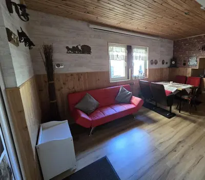 Ein Sitzbereich in der Unterkunft Ferienwohnung Ilka's Lodge