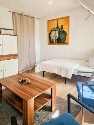 Ein Bett oder Betten in einem Zimmer der Unterkunft Gemütliche Ferienwohnung bei der neuen Messe Karlsruhe
