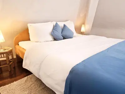 Ein Bett oder Betten in einem Zimmer der Unterkunft Gemütliche Ferienwohnung bei der neuen Messe Karlsruhe