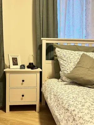 Ein Bett oder Betten in einem Zimmer der Unterkunft COZEE - Cozy 1-room Apartment with Netflix
