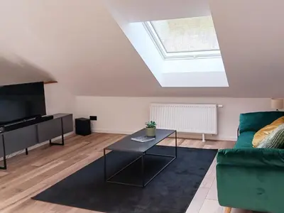 Ein Sitzbereich in der Unterkunft Ferienhaus am Wald