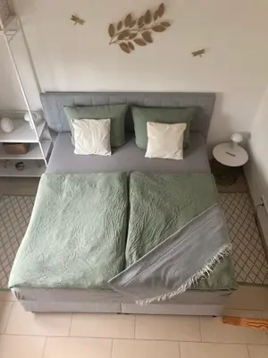 Ein Bett oder Betten in einem Zimmer der Unterkunft TinyHouse Pfalzperle - Auszeit nahe Deutsche Weinstraße & Therme