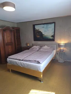 Ein Bett oder Betten in einem Zimmer der Unterkunft Darmstadt Living