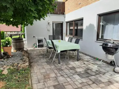 Ein Patio oder anderer Außenbereich in der Unterkunft Dörrs vacation home with pool and garden
