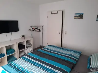 Ein Bett oder Betten in einem Zimmer der Unterkunft Dörrs vacation home with pool and garden