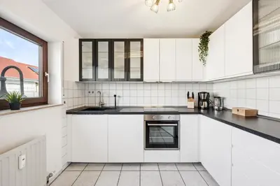 Küche/Küchenzeile in der Unterkunft Sali Homes Weingenuss Eichbrunnen - Zentral
