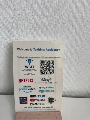 Ein Zertifikat, Auszeichnung, Logo oder anderes Dokument, das in der Unterkunft Tukhin's Residency - Studio Apartment & Deluxe 4 room Apartment ausgestellt ist