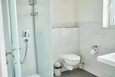 Ein Badezimmer in der Unterkunft Weißwein Apartment