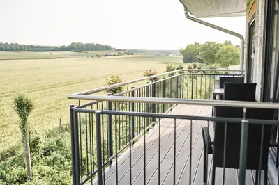 Ein Balkon oder eine Terrasse in der Unterkunft Rotwein Apartment