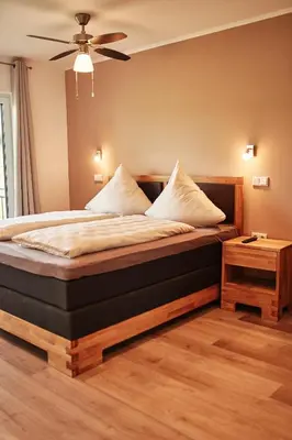 Ein Bett oder Betten in einem Zimmer der Unterkunft Ferienwohnung