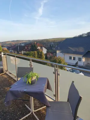 Ein Balkon oder eine Terrasse in der Unterkunft Zwischen Frankfurt und Würzburg im schönen Odenwald