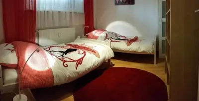 Ein Bett oder Betten in einem Zimmer der Unterkunft Gästewohnungen Enztal