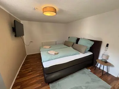 Ein Bett oder Betten in einem Zimmer der Unterkunft Ferienwohnung Neckarperle
