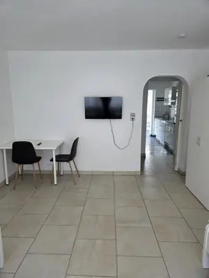 TV/Unterhaltungsangebot in der Unterkunft Apartment mit Wintergarten - Knielingen Industriepark