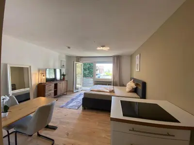 Ein Sitzbereich in der Unterkunft 1-Zimmerwohnung mit Balkon