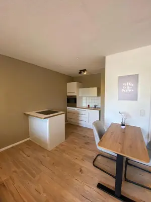 Küche/Küchenzeile in der Unterkunft 1-Zimmerwohnung mit Balkon