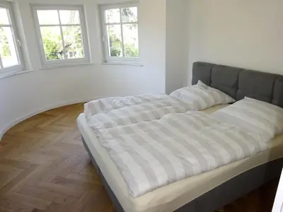 Ein Bett oder Betten in einem Zimmer der Unterkunft Ferienwohnung Rebenzauber Deidesheim