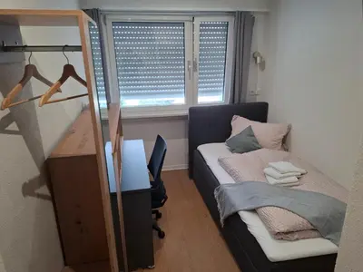 Ein Bett oder Betten in einem Zimmer der Unterkunft Gasthaus zur Bergstrasse