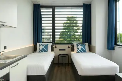 Ein Bett oder Betten in einem Zimmer der Unterkunft Four Points Flex by Sheraton Östringen
