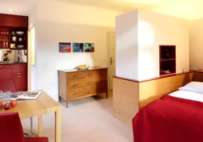 Ein Bett oder Betten in einem Zimmer der Unterkunft Villa Trautz Appartements