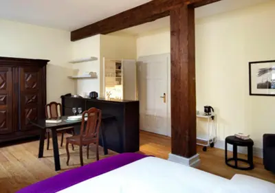 Ein Bett oder Betten in einem Zimmer der Unterkunft Villa Trautz Appartements