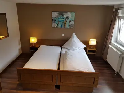 Ein Bett oder Betten in einem Zimmer der Unterkunft Gasthaus Zum Ochsen