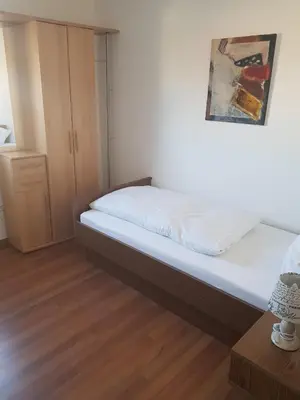 Ein Bett oder Betten in einem Zimmer der Unterkunft Gasthaus Zum Ochsen