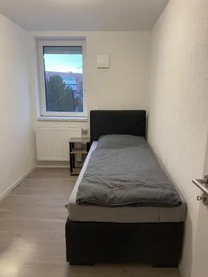 Ein Bett oder Betten in einem Zimmer der Unterkunft Exklusiv modernisierte Traumwohnung mit High-End-Lüftungssystem