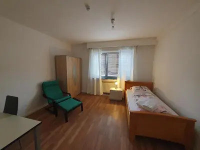 Ein Bett oder Betten in einem Zimmer der Unterkunft Schönes Privatzimmer an der Uniklinik Mainz