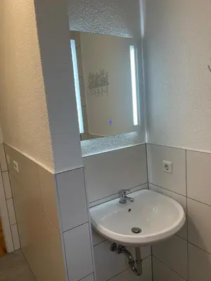 Ein Badezimmer in der Unterkunft Modernes Wohnerlebnis in bester Lage