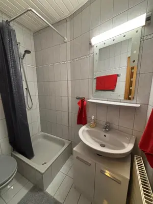 Ein Badezimmer in der Unterkunft See You 2