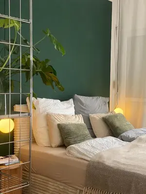 Ein Bett oder Betten in einem Zimmer der Unterkunft Luxuriöse, 3 - Schlafzimmer Ferienwohnung mit Tiefgarage & Balkon