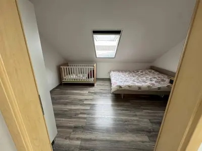 Ein Bett oder Betten in einem Zimmer der Unterkunft Wunderschöne und helle Wohnung