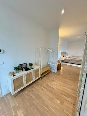 Ein Bett oder Betten in einem Zimmer der Unterkunft Tamm CityHub Zentral, Komfortabel, Tiefgarage