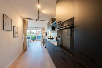 Küche/Küchenzeile in der Unterkunft Malu Rooms - im Zentrum, Kostenloser Parkplatz, Klima, Balkon, Netflix, 24h Checkin