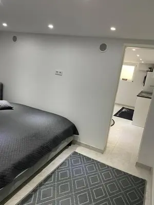 Ein Bett oder Betten in einem Zimmer der Unterkunft Stadtnah & und familienfreundlich