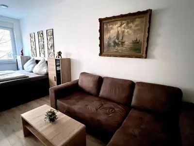 Ein Sitzbereich in der Unterkunft NEU Goldstadt Gallery City Suite Zentrum Pforzheim am Schlössle