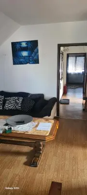 Ein Sitzbereich in der Unterkunft Dachgeschoss Wohnung mit Balkon