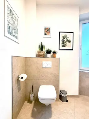 Ein Badezimmer in der Unterkunft COZEE - Spacious Apartment With Netflix