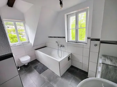 Ein Badezimmer in der Unterkunft Malerisches Apartment am Kirchplatz
