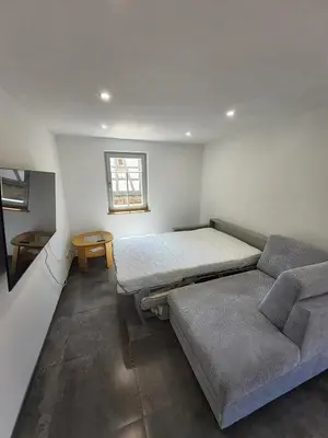 Ein Bett oder Betten in einem Zimmer der Unterkunft Carles Bauernhaus