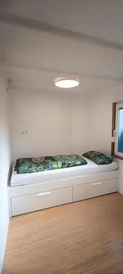 Ein Bett oder Betten in einem Zimmer der Unterkunft 70 qm Ferienwohnung,