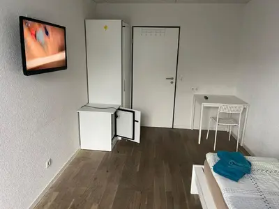 TV/Unterhaltungsangebot in der Unterkunft Boardinghouse Behrend I