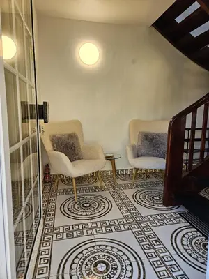 Ein Sitzbereich in der Unterkunft Gästehaus Schindhard