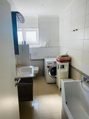 Ein Badezimmer in der Unterkunft Zentrale 4 Zimmerwohnung mit kostenlosem Stellplatz