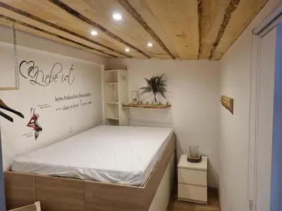 Ein Bett oder Betten in einem Zimmer der Unterkunft Ferien- und Monteurwohnung Grünstadt-Worms