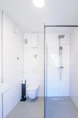 Ein Badezimmer in der Unterkunft MZK Maier Zentrales Apartment