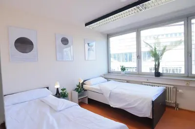 Ein Bett oder Betten in einem Zimmer der Unterkunft MZK Maier Zentrales Apartment